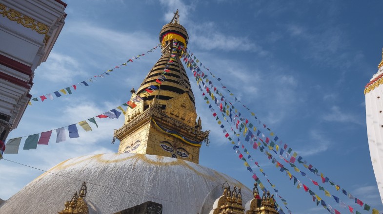 A view of Swoyambhunath from below on a sunny day in summer in Nepal.